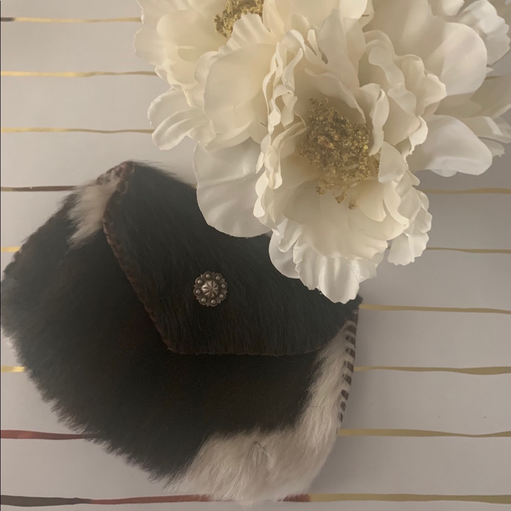 Cowhide & leather clutch
